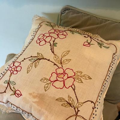 All the pillows in the world. One is Embroidered