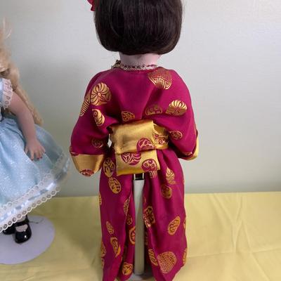 2 Porcelain Dolls Goldie Locks and Asian Doll