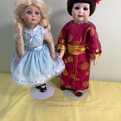 2 Porcelain Dolls Goldie Locks and Asian Doll