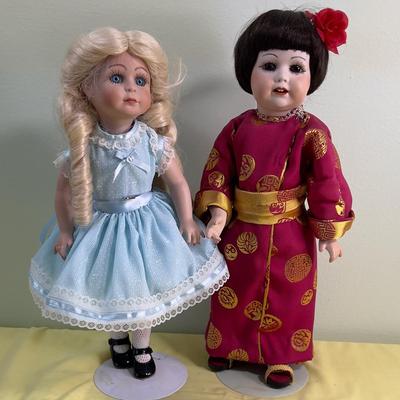 2 Porcelain Dolls Goldie Locks and Asian Doll