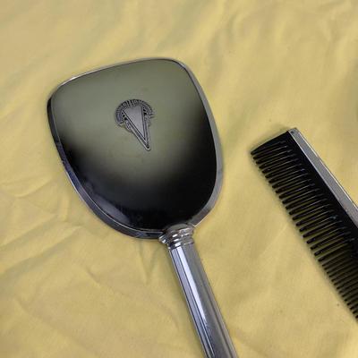 Mirror, Mirrors In the Hand, and a Comb