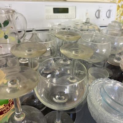 Stove Top Full of Glassware 