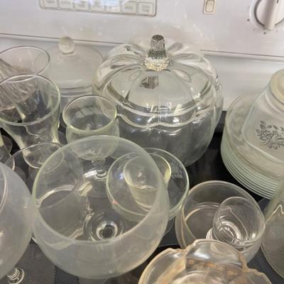 Stove Top Full of Glassware 