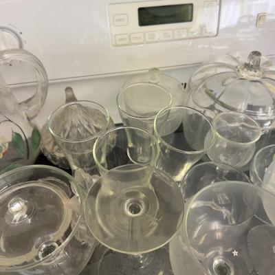 Stove Top Full of Glassware 