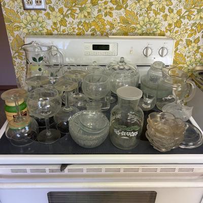 Stove Top Full of Glassware 