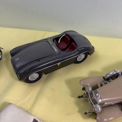 Pile of Built Plastic Models; Cars