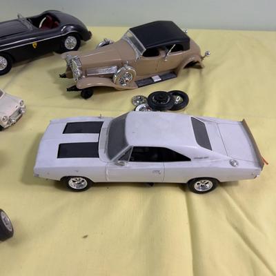 Pile of Built Plastic Models; Cars