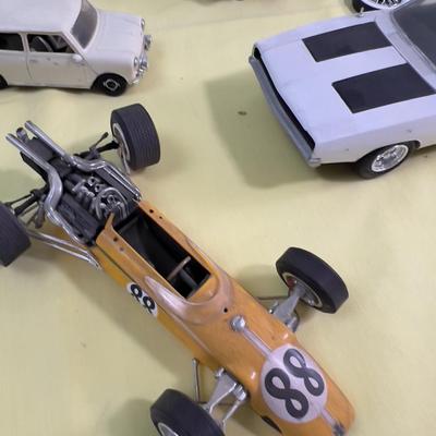 Pile of Built Plastic Models; Cars