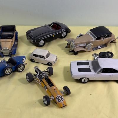 Pile of Built Plastic Models; Cars