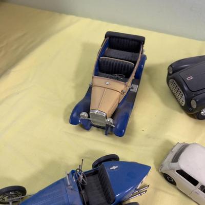 Pile of Built Plastic Models; Cars