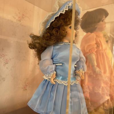 Blue Dress Porcelain Doll in a case