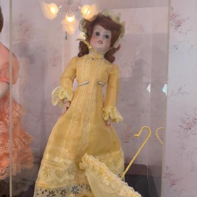 Yellow Dress Porcelain Doll In a Case. 