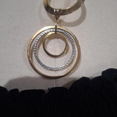 Sale Photo Thumbnail #3: Simple Modern Choker v swirl ball shape with pendant of rings- gold tone costume jewelry
