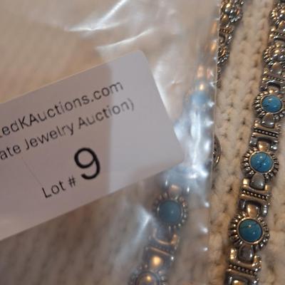 Sale Photo Thumbnail #39: There are no markings to indicate that is silver or real turquoise, it is costume but is very pretty costume.  There is an extra link to use on the watch or bracelet.