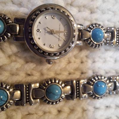 Sale Photo Thumbnail #35: There are no markings to indicate that is silver or real turquoise, it is costume but is very pretty costume.  There is an extra link to use on the watch or bracelet.