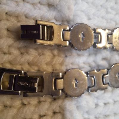 Sale Photo Thumbnail #37: There are no markings to indicate that is silver or real turquoise, it is costume but is very pretty costume.  There is an extra link to use on the watch or bracelet.