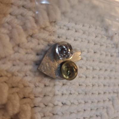 Sale Photo Thumbnail #71: Vintage enamel lapel pin featuring a heart with a bison and feathers