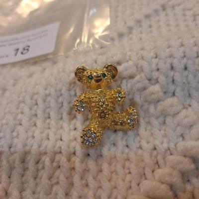 Sale Photo Thumbnail #73: small vintage teddy bear brooch with green eyes