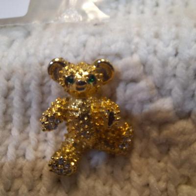 Sale Photo Thumbnail #74: small vintage teddy bear brooch with green eyes