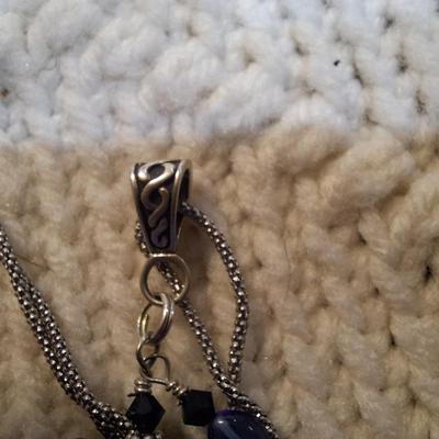 Sale Photo Thumbnail #95: Sterling silver chain with bear and bead pendant.