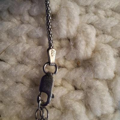 Sale Photo Thumbnail #98: Sterling silver chain with bear and bead pendant.