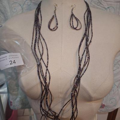 Sale Photo Thumbnail #105: Long purple seed bead necklace with matching earrings.
