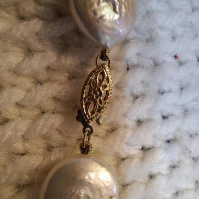 Sale Photo Thumbnail #139: These are real pearls and the clasp is marked 14k, they are the flat type pearls often referred to as "coin" pearls  please see all photos.
