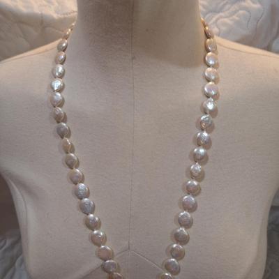 Sale Photo Thumbnail #136: These are real pearls and the clasp is marked 14k, they are the flat type pearls often referred to as "coin" pearls  please see all photos.