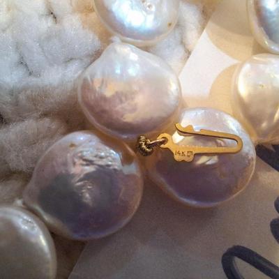 Sale Photo Thumbnail #141: These are real pearls and the clasp is marked 14k, they are the flat type pearls often referred to as "coin" pearls  please see all photos.