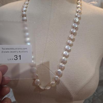 Sale Photo Thumbnail #135: These are real pearls and the clasp is marked 14k, they are the flat type pearls often referred to as "coin" pearls  please see all photos.