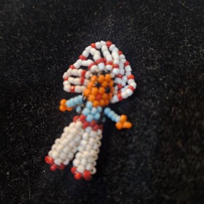 Sale Photo Thumbnail #154: Vintage southwest American Indian Chief lapel pin or brooch from seed beads