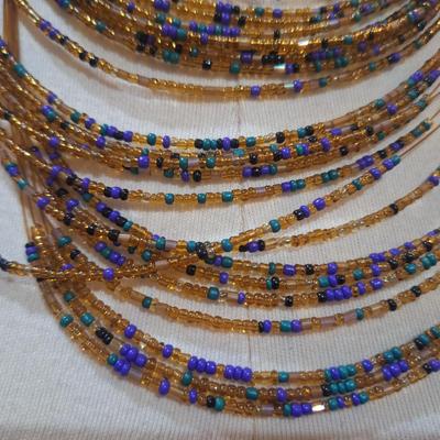 Sale Photo Thumbnail #189: multi strand necklace with orange and blue seed beads and matching earrings