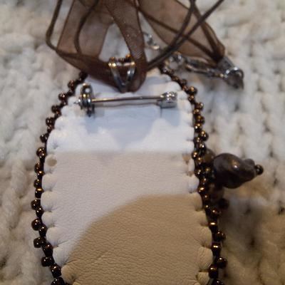 Sale Photo Thumbnail #195: handcrafted necklace and earring set with large pendant.  Pendant and earrings have leather backing.  Pendant can also be a brooch.
