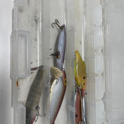 Fishing lures in 2 plastic organizers