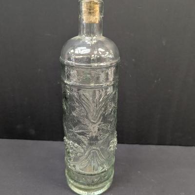 Sale Photo Thumbnail #1439: William Sonoma Made In Spain Embossed Clear Green Glass Bottle