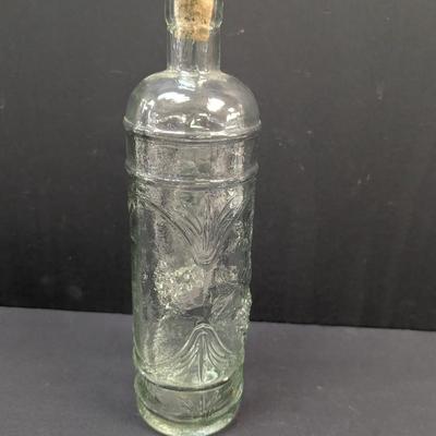 Sale Photo Thumbnail #1438: William Sonoma Made In Spain Embossed Clear Green Glass Bottle