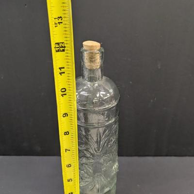 Sale Photo Thumbnail #1440: William Sonoma Made In Spain Embossed Clear Green Glass Bottle