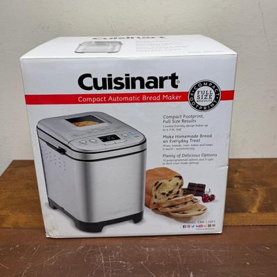 Sale Photo Thumbnail #306: For making White, French and Whole Wheat bread, has 12 pre-set functions. Model CBK-110P1. In original box. Like-new condition.