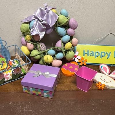 Sale Photo Thumbnail #368: Wreath made with colored eggs, hanging signs, metal baskets, boxes and more.