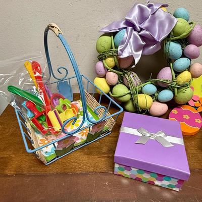 Sale Photo Thumbnail #367: Wreath made with colored eggs, hanging signs, metal baskets, boxes and more.