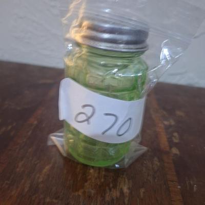 Vaseline glass or uranium glass salt shaker