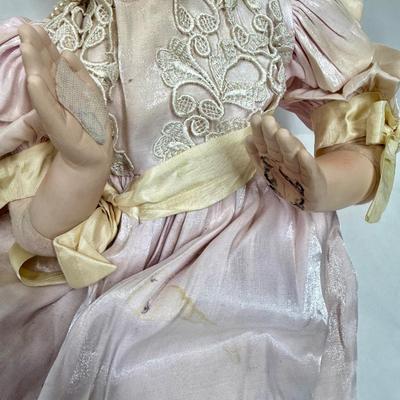 Sale Photo Thumbnail #245: In fair condition. Her hair is a little messy. Her hands have had velcro applied to hands to keep them together in prayer. She's wearing a vintage pearl necklace.