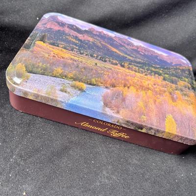 Lot 210 Tin of goodies