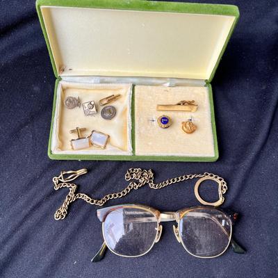 Lot 211 Box of men's jewelry