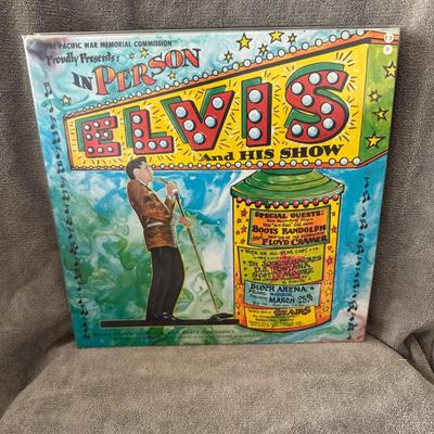 Sale Photo Thumbnail #22: limited edition  commemorating Elvis Presley's benefit concert at Bloch Arena, Pearl Harbor, Hawaii on March 25th, 1961. 
Here's more information about this significant event and the commemorative :
The Concert's Purpose: This concert was held to raise fu
