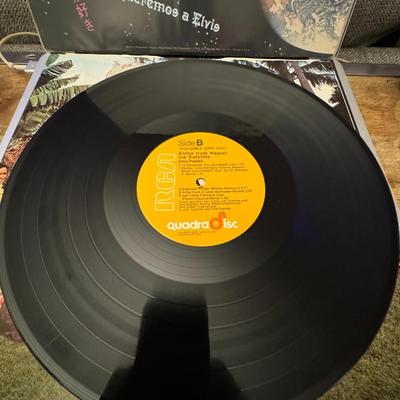 Sale Photo Thumbnail #29: Elvis Presley's Aloha from Hawaii via Satellite, a historic live album released by RCA Records in February 1973. 
Here's more about this iconic album:
Pioneering Satellite Broadcast: This album captures the performance from Elvis Presley's groundbreaking 