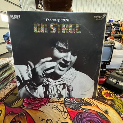 Sale Photo Thumbnail #48: On Stage (subtitled February, 1970) by American singer Elvis Presley. 
Here's more information about this album:
Release and Type: It's a live album released by RCA Records in June 1970.
Recording Details: The album was recorded live between February 17 a