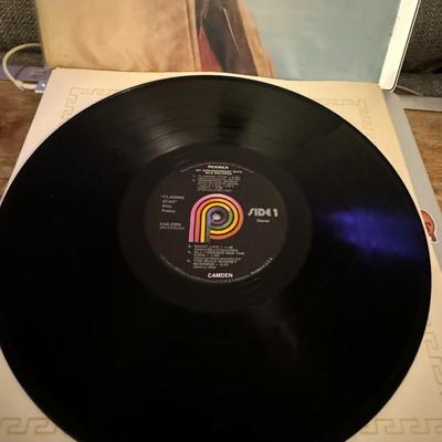 Sale Photo Thumbnail #74: The image you sent shows the album "Elvis Sings Flaming Star" by Elvis Presley.
Here's some information about this album:
Album Title: Elvis Sings Flaming Star.
Artist: Elvis Presley.
Release Year: Originally released in 1969 on the RCA Camden budget labe