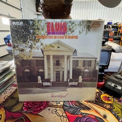 Sale Photo Thumbnail #129: Elvis Recorded Live on Stage in Memphis by Elvis Presley. 
Here's more information about this album:
Release and Recording: This is a live album released by RCA Records on July 8, 1974, and was recorded on March 20, 1974, at the Mid-South Coliseum in Memp