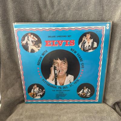 Sale Photo Thumbnail #171: "Rockin' With Elvis New Year's Eve," a deluxe 2-record set featuring Elvis Presley's concert performance in Pittsburgh, PA, on December 31, 1976. 
Here are some details about this album:
Concert Details: The album captures Elvis Presley's iconic New Year'